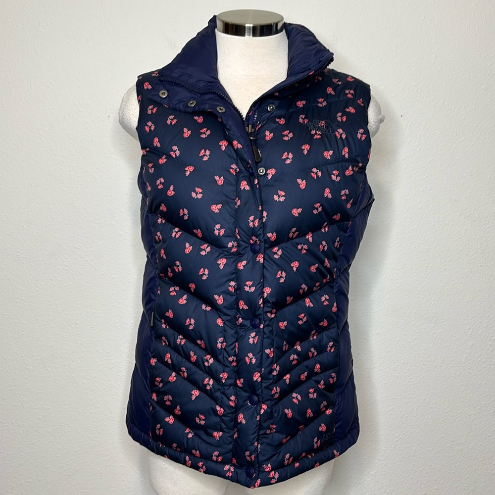 The North Face Navy Blue Quilted Puffer Vest with Pink Floral Print